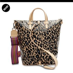 The new ahun in its bag just arrived on 11/24/2023  .consuela blue jag sling